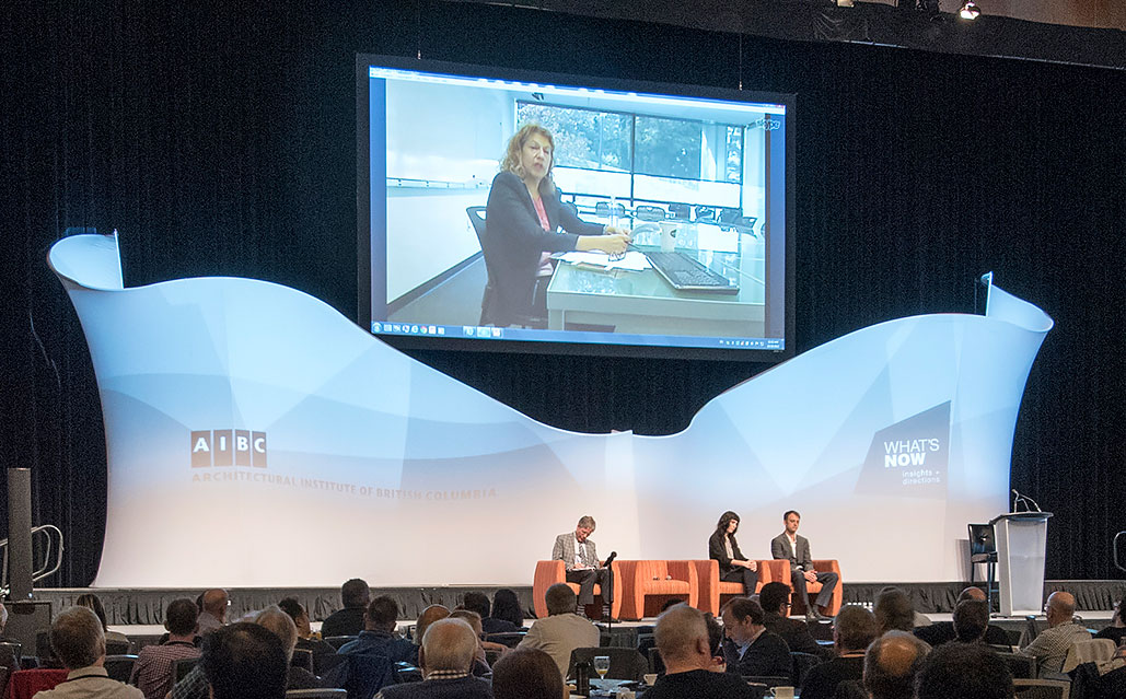 Image: Nana Last onscreen during the Fluidity and Architecture plenary session October 29, 2015 at the AIBC Annual Conference. Photo by Jay Shaw