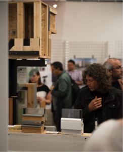 Art & Science of the High-Performance Passive House reception and panel discussion attendees examine Passive House wall sections that were part of the November Architecture Centre Gallery exhibit.
